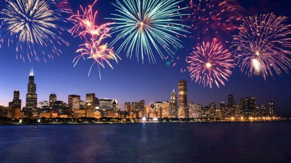 city skyline with fireworks display